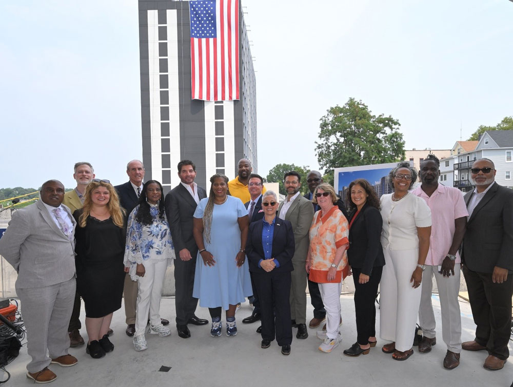 QWest-Towers Photo of officials in front of QWest Tower Topping Off ceremony